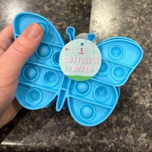 2 Blue Butterfly Popper Toys